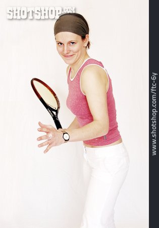 
                Junge Frau, Tennisschläger                   