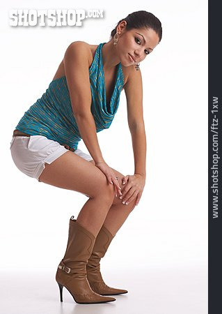 
                Young Woman, Boot, Squatting                   