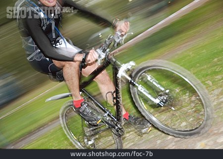 
                Bewegungsunschärfe, Radfahrer, Mountainbike                   
