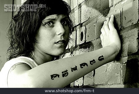 
                Young Woman, Tattoo                   