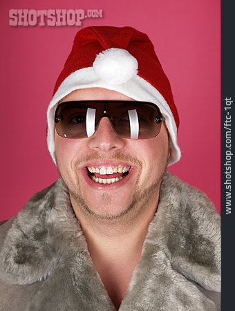 
                Mann, Weihnachten, Sonnenbrille, Weihnachtsmannmütze                   