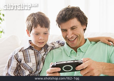 
                Vater, Digitalkamera, Sohn                   