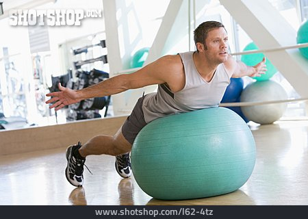 
                Mann, Dehnübung, Gymnastikball, Workout                   
