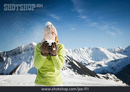 
                Young Woman, Winterly, Blowing                   