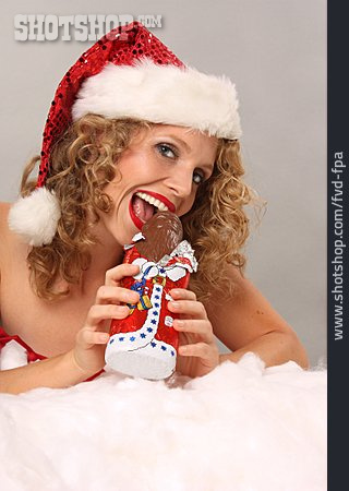 
                Schokoladenweihnachtsmann, Weihnachtsfrau, Abbeißen                   