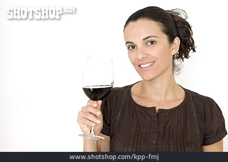 
                Frau, Rotweinglas, Zuprosten                   