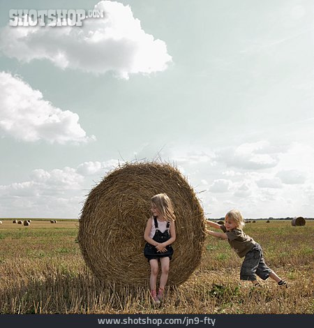 
                Boy, Child, Summer, Straw Bales, Corn Field, Rural Scene, Pushing                   