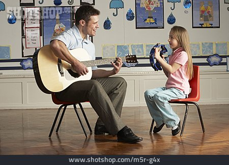 
                Playing Music, Music Lessons, Music School                   
