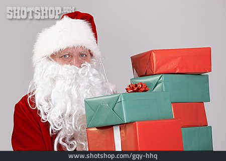 
                Weihnachtsmann, Bescherung, Geschenkestapel                   