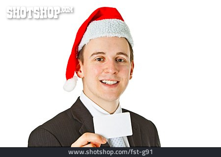 
                Geschäftsmann, Visitenkarte, Weihnachtsmannmütze                   