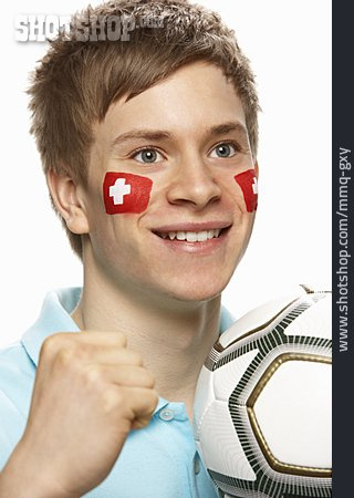 
                Junger Mann, Schweiz, Patriotismus, Fußballfan                   