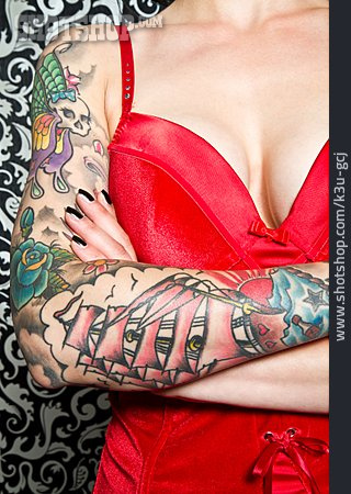 
                Young Woman, Tattoo, Cleavage                   