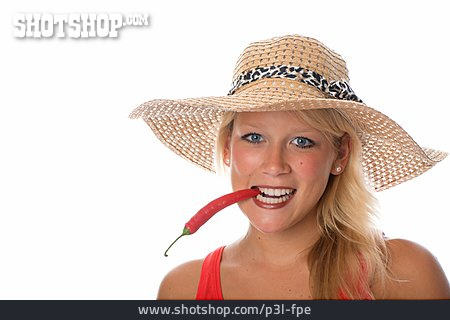 
                Young Woman, Biting, Spicy, Chilli Pod                   