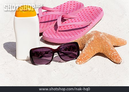 
                Strandurlaub, Sonnencreme, Flip-flops                   