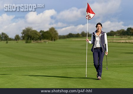 
                Golfplatz, Flaggenstock, Golfspielerin                   