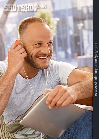 
                Man, Listening Music, Tablet-pc                   
