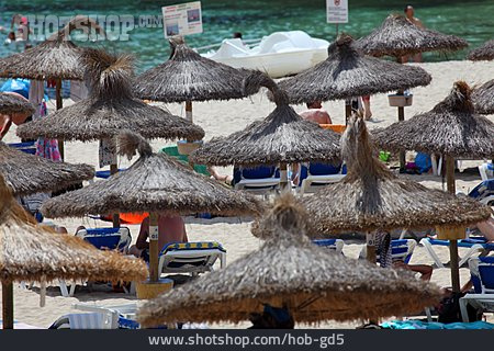 
                Strandurlaub, Strohschirm                   