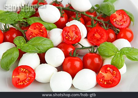 
                Basilikum, Tomate, Mozzarella                   
