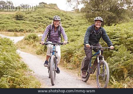 
                Cycling, Cycling, Older Couple                   