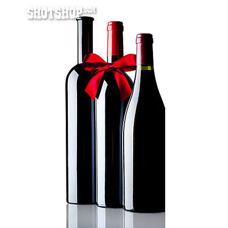 
                Geschenk, Rotweinflasche, Rote Schleife                   