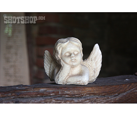 
                Angel Figurine                   