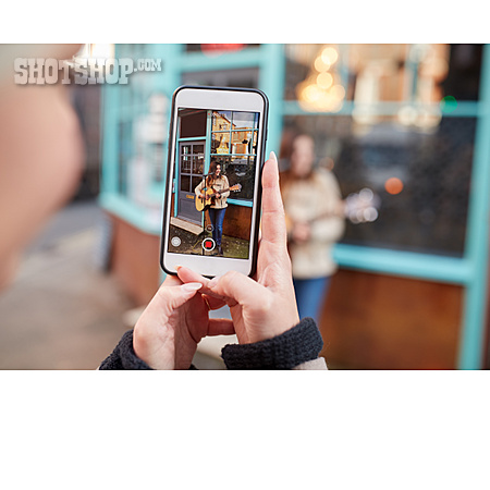 
                Smart Phone, Street Busker, Filming                   