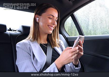
                Business Woman, Smiling, On The Move, Car Trip, Taxi                   
