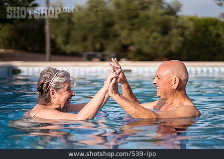 
                Holding Hands, Affection, Pool, Carefree, Older Couple                   