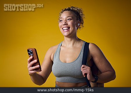 
                Sportlerin, Smartphone, Musik Hören                   